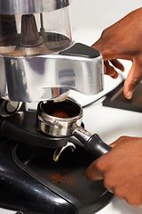 Image showing Barista hands, cafe and espresso with coffee machine for service with brewing process in closeup. Restaurant, hot beverage and hand with person working for preparation with premium caffeine blend.