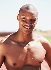 Image showing Fitness, portrait and happy man runner at a race track for health, exercise and cardio routine. Smile, face and topless African male athlete at a stadium for performance, challenge and training run