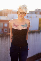 Image showing Punk, tattoo and portrait of woman in city for creative, urban and culture. Happy, pride and identity with rebel female person on rooftop in outdoor for unique, hipster and rocker fashion