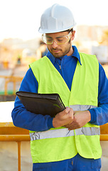 Image showing Man, architect and portfolio file for construction planning, blueprint or building maintenance on site in city. Male person, engineer or contractor with document for architecture inspection in town