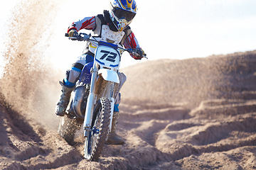 Image showing Competition, sand and motorbike for sports with action for challenge on course with power. Speed, performance and desert with bike for race or adventure in outdoor with freedom or fearless driving