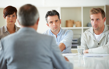 Image showing Serious, meeting and business people in discussion in the office for human resources problem. Collaboration, team and group of professional employees talking on corporate hr issue in modern workplace