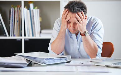 Image showing Head, business and man with stress, tired and fatigue with a new project, documents and chaos. Male person, employee and architect with mental health issue, depression and migraine with paperwork