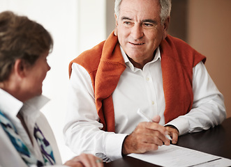 Image showing Booking, reception desk and happy couple talking of hospitality, customer service and tourism vacation or holiday. Mature people writing, signature or registration for hotel or travel agency advice