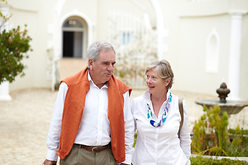 Image showing Walking, talking and a senior couple in the city for a retirement holiday, travel and happiness. Smile, love and an elderly man and woman on a walk in an old town or hotel during a vacation together