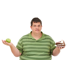 Image showing Plus size, diet decision and man portrait with a apple and cake choice thinking about balance. Male model, studio and white background with healthy and dessert with weight loss and nutrition mockup