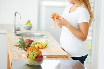 Image showing Woman hands, orange peel and fruit for health food and nutrition for weight loss diet and health at home. Kitchen, fruits and plus size person in a house with breakfast and nutritionist in morning