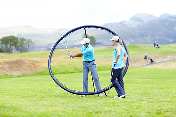 Image showing Ring, sports woman or golfer in golf course lesson for fitness, workout or exercise with a swing on field. Coaching, golfing game or athlete training with instructor for driving with a club stroke