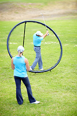 Image showing Ring, woman or beginner golfer in golf course lesson for fitness, workout or exercise with a swing on field. Coaching, golfing game or athlete training with instructor for driving with a club stroke