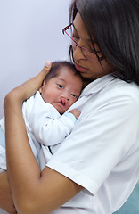 Image showing Medicine, cleft lip and a pediatrician with a baby in the hospital for healthcare, insurance or treatment. Medical, children and a doctor woman holding a newborn infant with a disability in a clinic