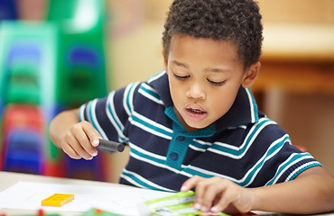 Image showing School, creative and a child drawing in a class for education, learning and creativity. Table, classroom and a little male student doing art at kindergarten or creche to learn about color and playing