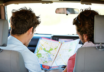 Image showing Road trip, map and people for travel adventure, journey and holiday with tourism guide, check and planning. Driver, men or young friends with location search, direction and destination from behind