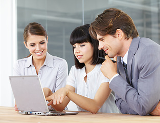 Image showing Business people, laptop and meeting in teamwork, collaboration or planning for marketing strategy at the office. Businessman and women working on computer for ideas or project plan at the workplace