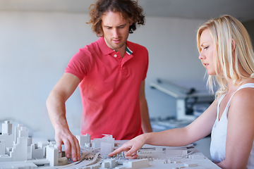 Image showing Architecture, model and business people planning, teamwork and building development solution or ideas. Process, startup and engineering woman with designer or partner talking of 3d infrastructure