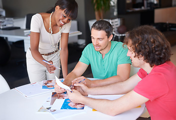 Image showing Diversity, colleagues planning and at desk in a modern workplace office together for support. Collaboration or teamwork, ideas or strategy and coworkers brainstorming or planning at workstation