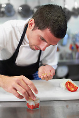 Image showing Chef, cooking and food with man in kitchen for luxury, hospitality and catering. Fine dining, gourmet and dinner with male cook in hotel restaurant for menu, cuisine and meal preparation