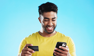 Image showing Online shopping, excited or happy man with credit card, phone or digital bank payment for studio fintech sale. Finance app, e commerce banking trade or customer search retail product on store website