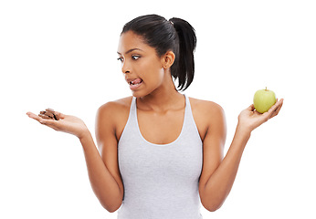 Image showing Hands, decision and woman with apple, chocolate and lifestyle choice on transparent, isolated and png background. Sugar, fruit and female person with lose weight temptation, cheat day or craving