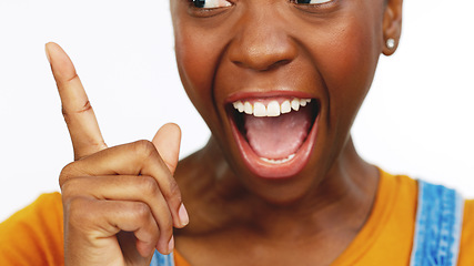 Image showing Hand, idea and breakthrough with an african female feeling excited while contemplating a thought. Thinking, wow and lightbulb moment with a black woman in studio isolated on a white background.