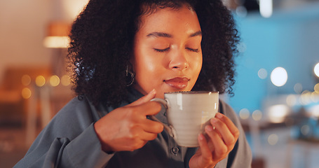 Image showing Relax, night and woman with coffee, peace and calm in living room, smile and happiness. Female, tea and lady with contemplation, break and natural aroma with rest, gratitude and thinking in lounge