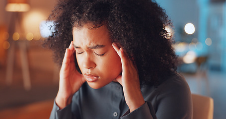 Image showing Stress, headache and woman in the office at night working on a corporate project with a deadline. Frustration, migraine and tired professional female business employee with burnout in the workplace.