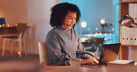 Image showing Laptop, customer service and remote work with a business black woman in her home at night for support. Contact us, smile and consulting with a happy female employee working at a desk in her house