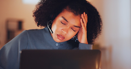 Image showing Call center, night and headache with black woman in office for stress, overtime and mental health. Customer service, communication and hotline with employee suffering from pain, tired and burnout