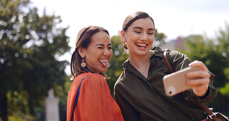 Image showing Selfie, women and friends outdoor, smile and weekend break with joy, relax and share post. Females, people and girls with smartphone, social media and memory in a park, care and peace sign on a trip