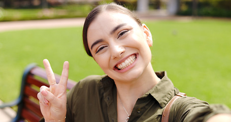 Image showing Selfie, hand gesture and face of woman at park taking pictures for social media with happy influencer. Portrait, profile picture and funny person outdoor take pov photo for thumbs up and peace sign.