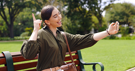 Image showing Woman, kiss selfie , blog post or video call on urban adventure with internet. Girl, metro and freedom with photography, profile picture and influencer on social media app