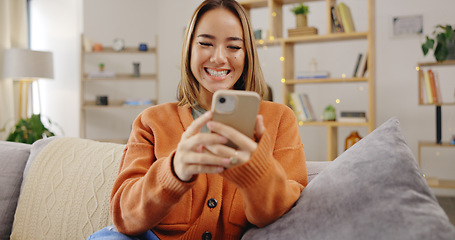 Image showing Woman, phone and video call on home sofa with internet connection to wave hand for hello while talking. Asian female happy, relax and online for a conversation on social media or communication app