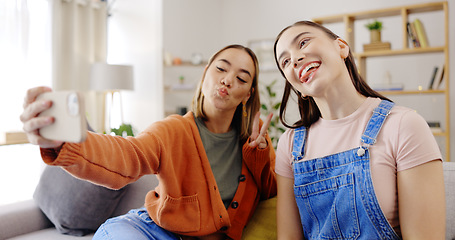 Image showing Selfie, happy and women or friends on sofa for social media update, influencer post or digital memory with emoji face. Young, gen z people in profile picture or photography online and peace hand sign