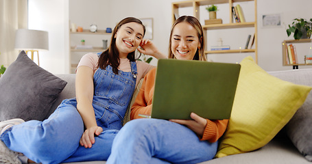 Image showing Relax, friends and women with a laptop, sofa and happiness in living room, streaming movies and rest. Female people, joy and girls with technology, happy and search internet on break and laughing