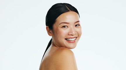 Image showing Asian woman, skincare and face of beauty, smile and laser transformation on studio white background. Happy model, portrait and aesthetic wellness for salon cosmetics, healthy shine and dermatology