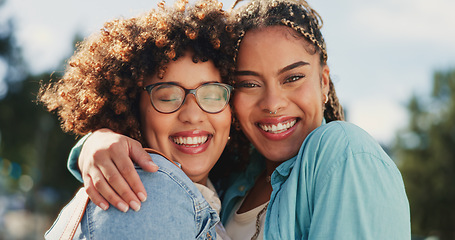 Image showing Friends, sisters and portrait of black women hugging outside with smile, happiness and solidarity in love and pride. Lesbian couple, woman and friend in happy embrace for support and trust together.