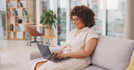 Image showing Startup, woman on couch and laptop for remote work from home, connection and typing for data analysis. Female entrepreneur, happy freelancer and consultant in living room, device and website launch