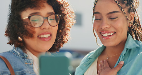 Image showing Laughing, phone and friends in a city online for meme, comic or app against an urban background. Joke, women and smartphone outdoors, talk and searching, browsing or share social media meme in London