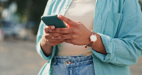 Image showing Hand of female chatting on mobile smartphone app for networking with 5G connection in urban town. Woman, hands and phone typing in city for social media post, communication or texting in the outdoors