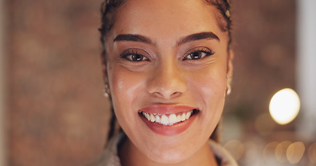 Image showing Night, happy and smile with black woman in office for overtime, confidence and professional. Pride, deadline and business with portrait of employee in agency for positive, empowerment and commitment