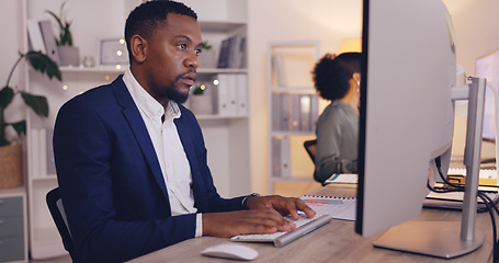 Image showing Corporate, focus and male worker at desk for writing email, website research and report, Laptop, office administration and happy black man typing finance report, online banking