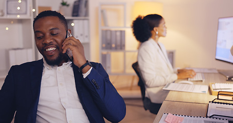 Image showing Laugh, night and phone call with black man in office for consulting, networking and communication. Discussion, connection and hello with male in agency for commitment, positive and overtime