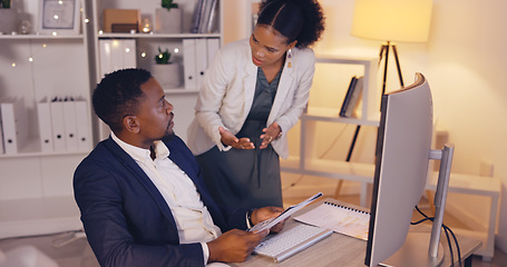 Image showing Teamwork, documents and business people in office planning for project deadline, proposal or report at night on computer. Review, feedback and black woman talking to partner or manager for paperwork