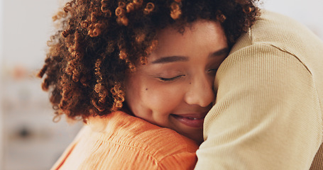 Image showing Hug, house and a couple embracing with a smile, comfort and love in the living room. Happiness, care and a man and woman hugging for affection, missing and caring together in the lounge of a home