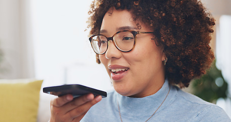 Image showing Voice call, phone and woman on sofa talking, communication or networking on mobile app or voip. Young biracial person speaking on smartphone, recording audio or online translation service at her home