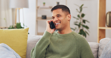 Image showing Man, laughing and hello for talking with phone call in living room, communication or networking to chat on sofa. Happy male person, smartphone and smile for mobile conversation, contact or connection