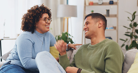 Image showing Couple have conversation, communication and funny story in living room, spending quality time together on couch. Partner, love and respect, people talking and connection with laughter and happiness