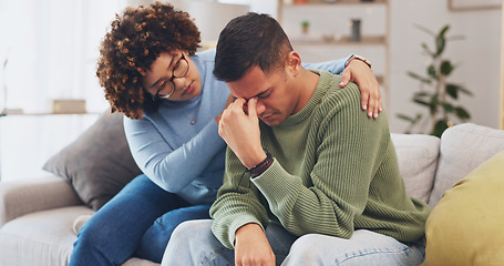 Image showing Grief, loss with mental health and sad, stress and people in relationship in crisis. Couple, depression and woman comfort man with empathy, support and love while sitting in living room at home.