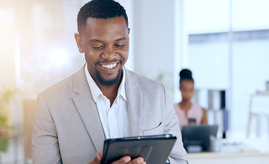 Image showing Funny, tablet and businessman laughing at social media meme in the internet or online while working in an office. Joke, corporate and black man entrepreneur laugh at fake news on the web or website