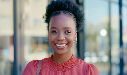 Image showing Happy, laughing and face of a black woman in the city for business, commute and work break. Smile, cheerful and the portrait of an African employee with happiness, confidence and funny in town