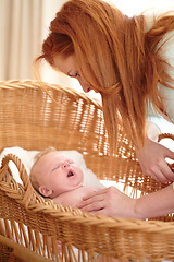 Image showing Woman, baby and home bedroom with morning nap, tired yawn and parent love in nursery. Newborn, mother and mama care with young child with sleep in a house with childcare in bed with mom support